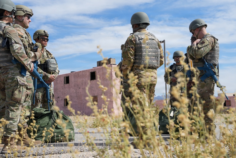 Combat readiness inspection integrates simulated threats; 432nd Wing Airmen respond