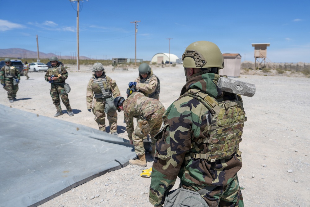 Combat readiness inspection integrates simulated threats; 432nd Wing Airmen respond