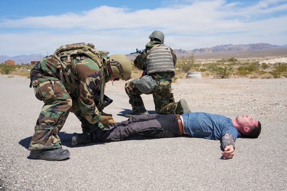 Combat readiness inspection integrates simulated threats; 432nd Wing Airmen respond