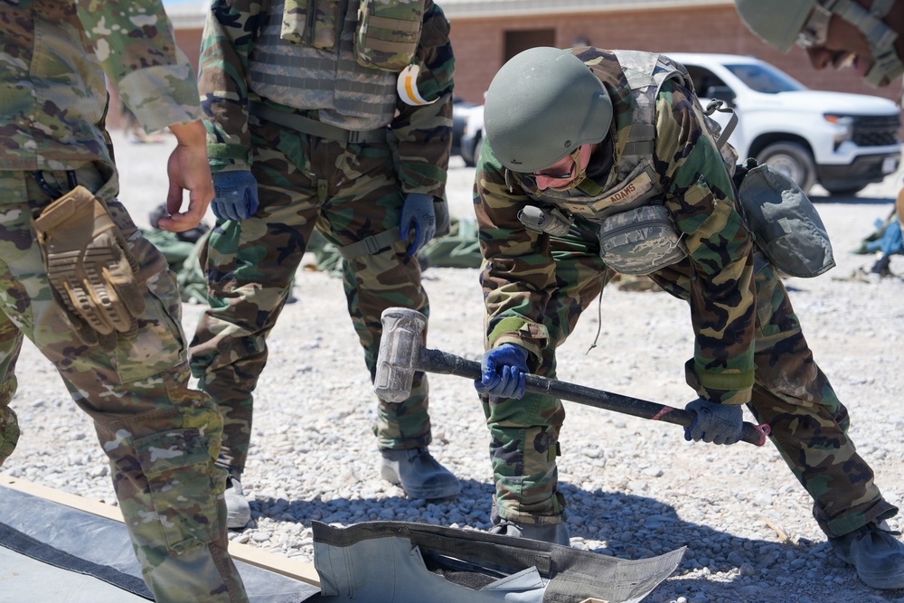Combat readiness inspection integrates simulated threats; 432nd Wing Airmen respond