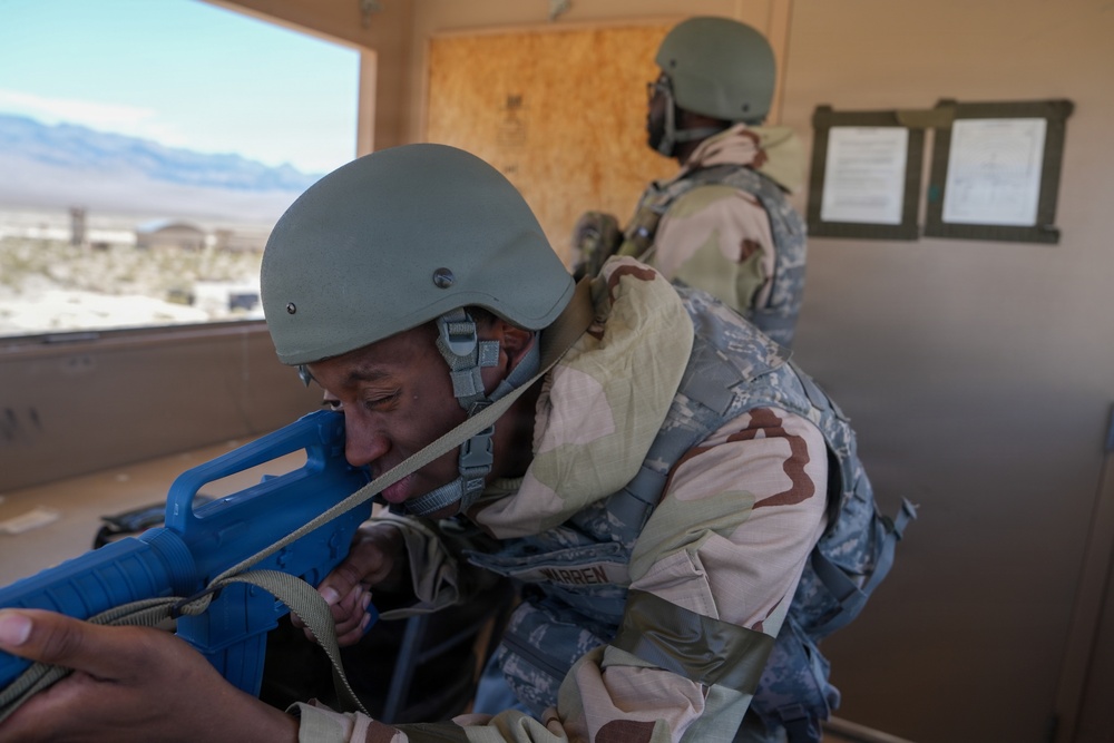 Combat readiness inspection integrates simulated threats; 432nd Wing Airmen respond