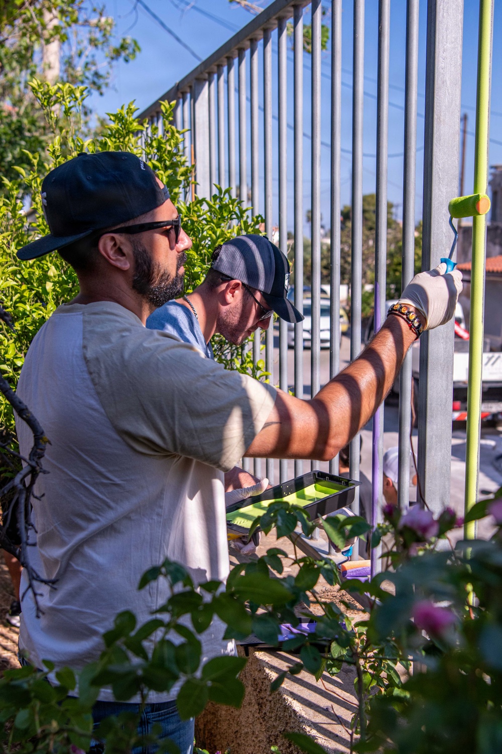 NSA Souda Bay Sailors paint a local elementary school