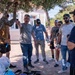 NSA Souda Bay Sailors paint a local elementary school