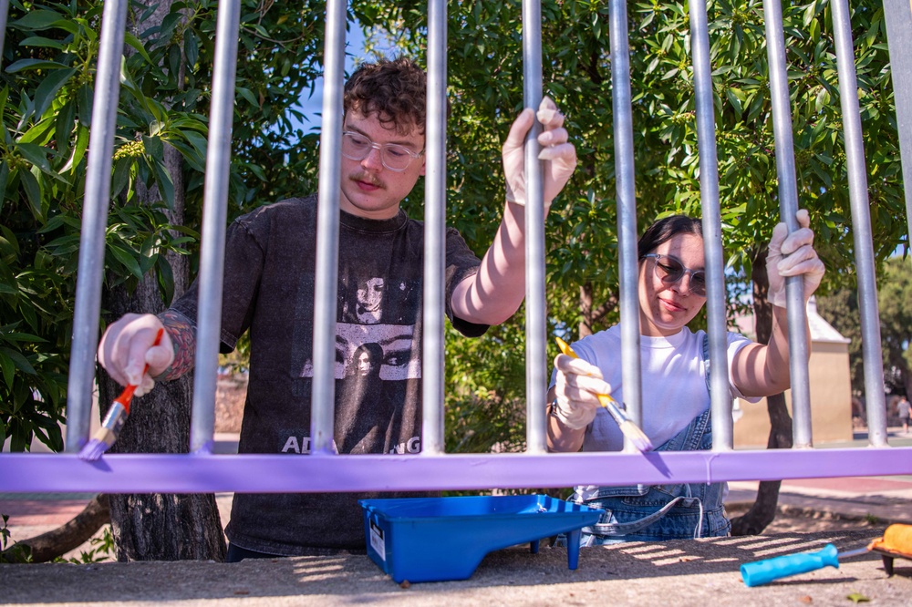 NSA Souda Bay Sailors paint a local elementary school