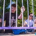 NSA Souda Bay Sailors paint a local elementary school