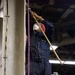 Iwo Jima Sailor Performs Preservation