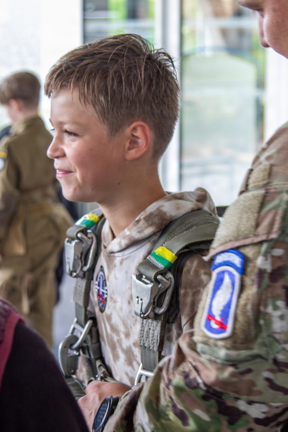 Paratroopers conduct parachute demonstration for French school at D-Day 82