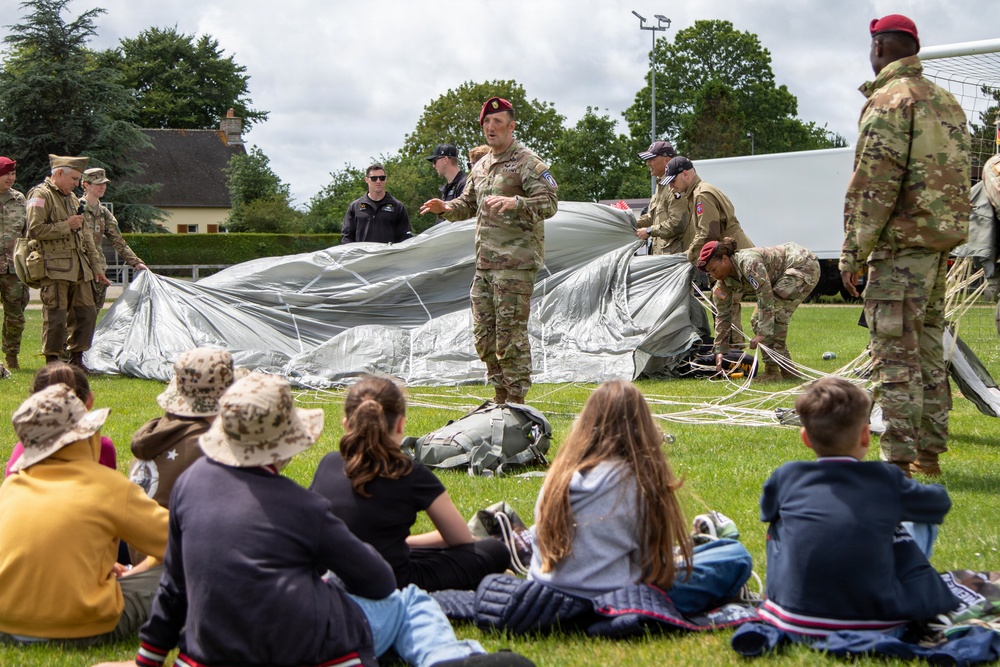 Paratroopers conduct parachute demonstration for French school at D-Day 82
