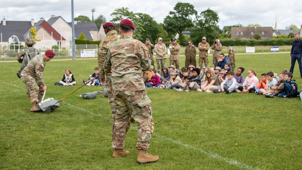 Paratroopers conduct parachute demonstration for French school at D-Day 82