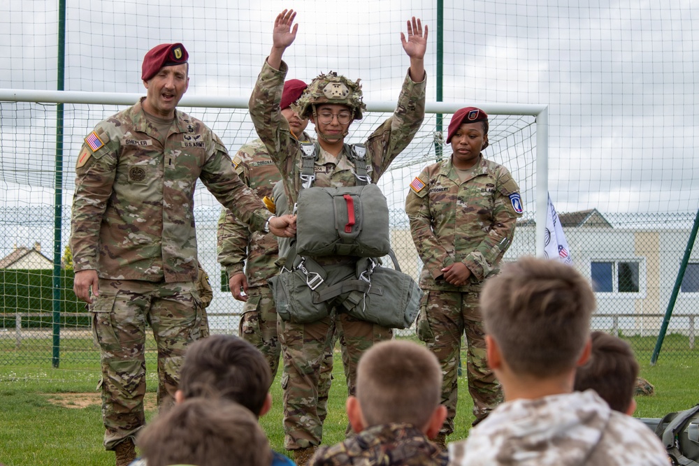 Paratroopers conduct parachute demonstration for French school at D-Day 82