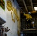 USS Iwo Jima Sailor Paints the Hangar Bay