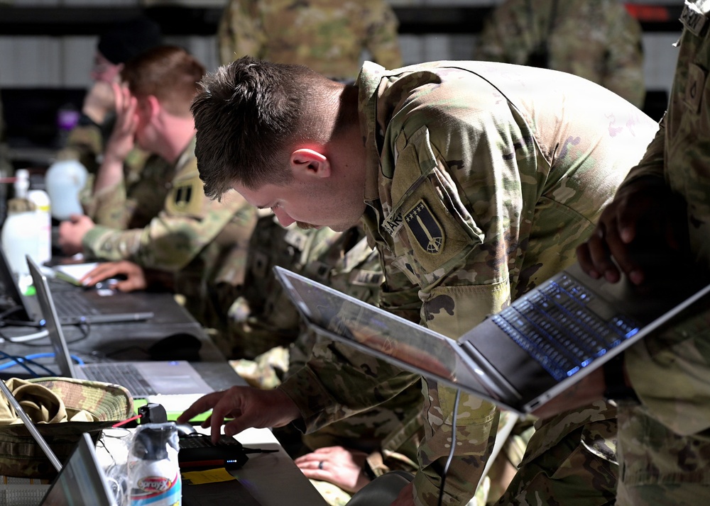 Electromagnetic Warfare Specialists operate within the Tactical Operations Center