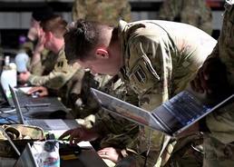 Electromagnetic Warfare Specialists operate within the Tactical Operations Center