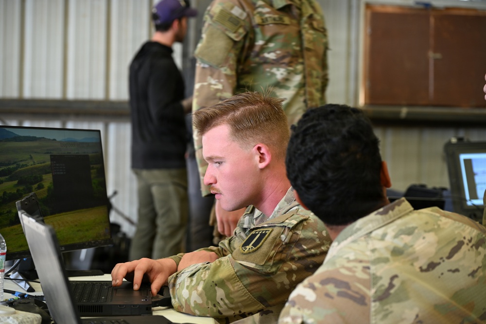 Soldiers operate AGVs at Arcane Thunder
