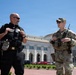 West Virginia National Guardsman Speaks to Police Officer At Columbus Circle