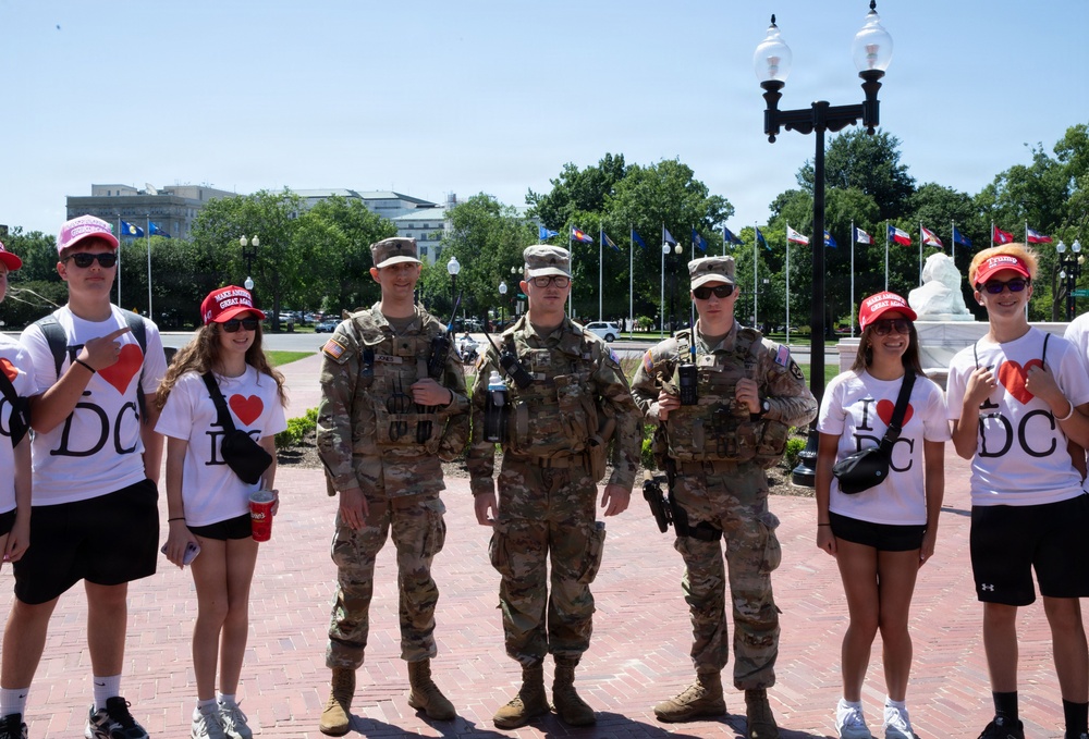West Virginia National Guard Pose for a photo with civilians in Union Station