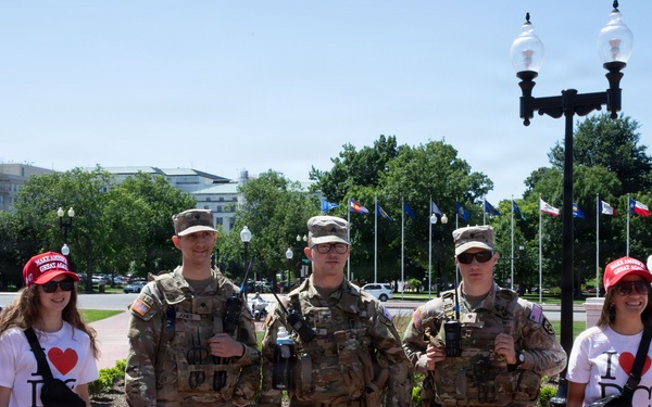 West Virginia National Guard Pose for a photo with civilians in Union Station