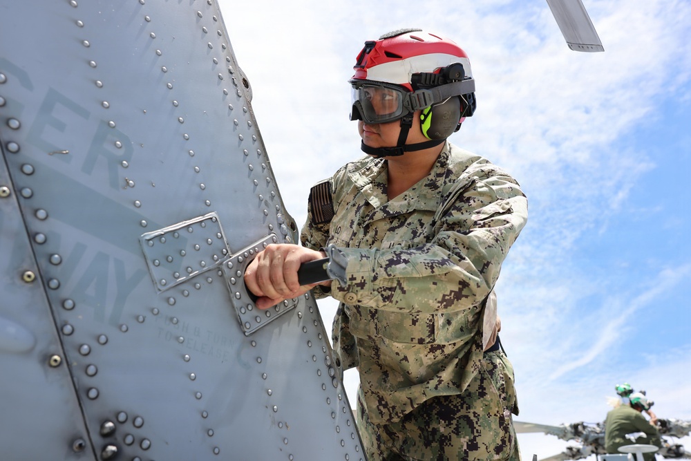 HSM-37 Sailors conduct helo maintenance