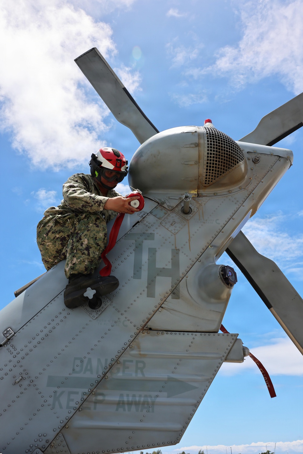 HSM-37 Sailors conduct helo maintenance