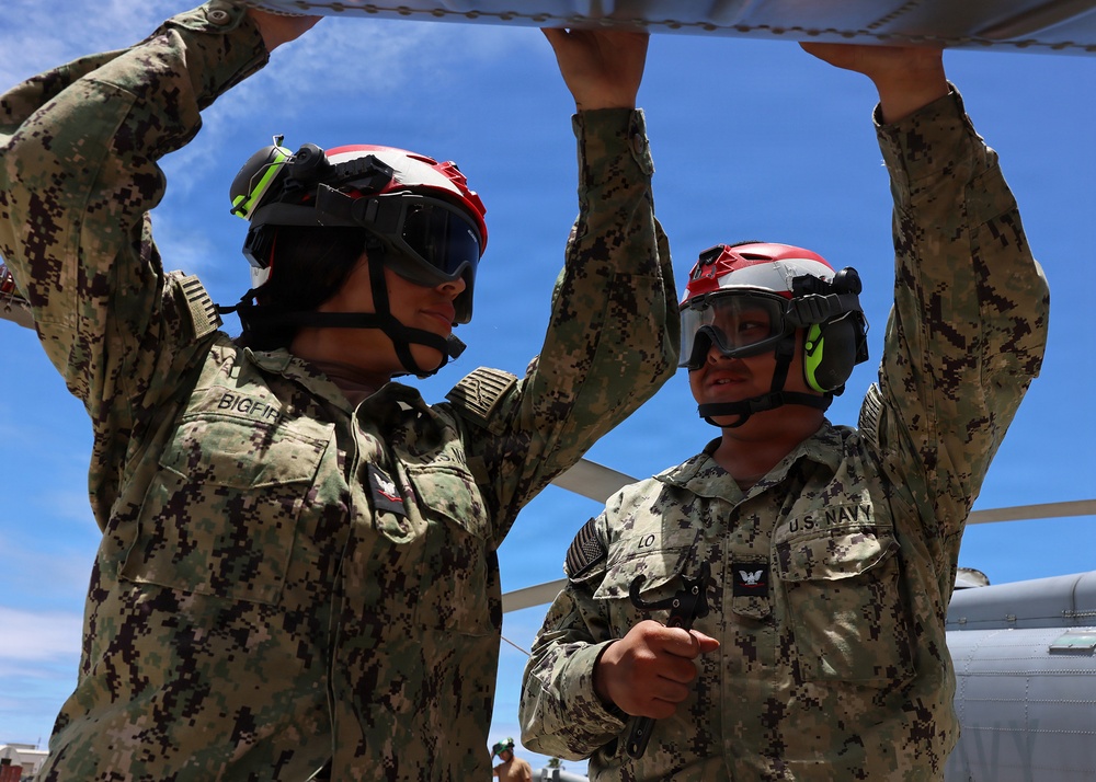 HSM-37 Sailors conduct helo maintenance
