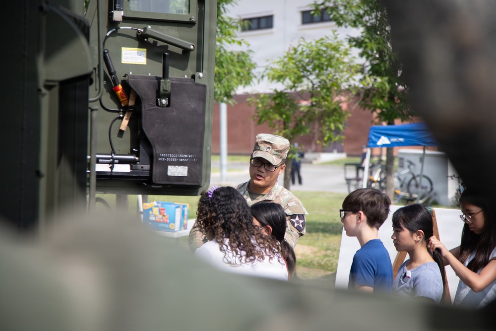 Soldiers from 6-37 Field Artillery Regiment hosts a static display for Humphreys Middle School