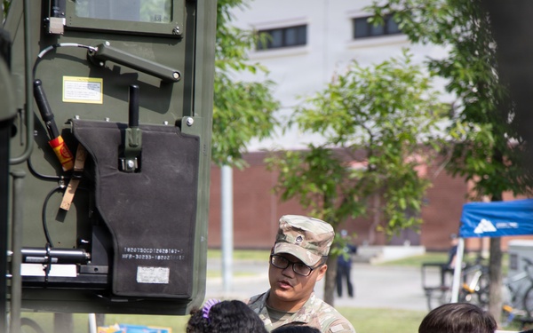 Soldiers from 6-37 Field Artillery Regiment hosts a static display for Humphreys Middle School