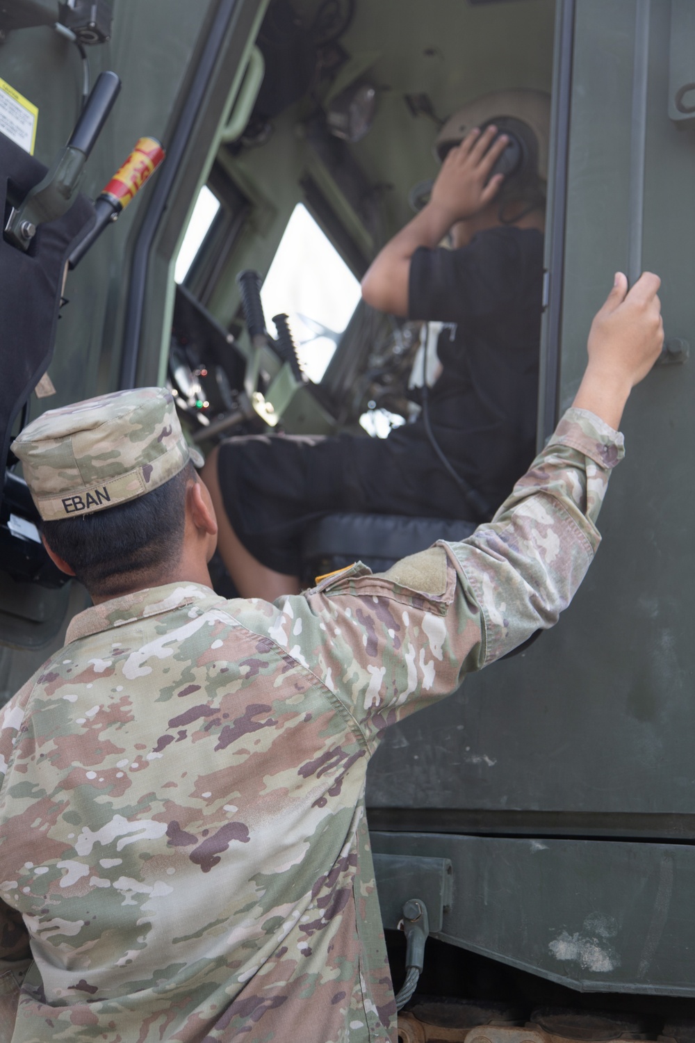 Soldiers from 6-37 Field Artillery Regiment hosts a static display for Humphreys Middle School