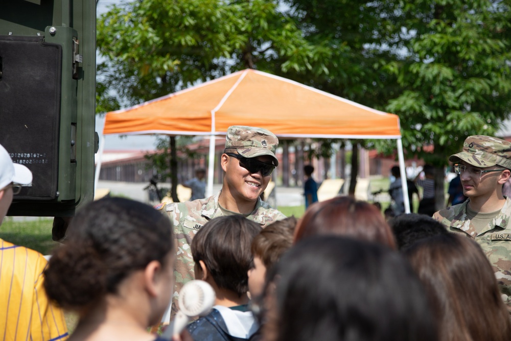 Soldiers from 6-37 Field Artillery Regiment hosts a static display for Humphreys Middle School