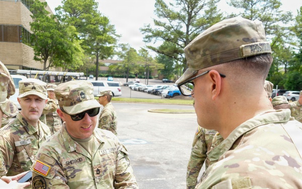 Tennessee Army National Guardsmen congratulates new sergeant