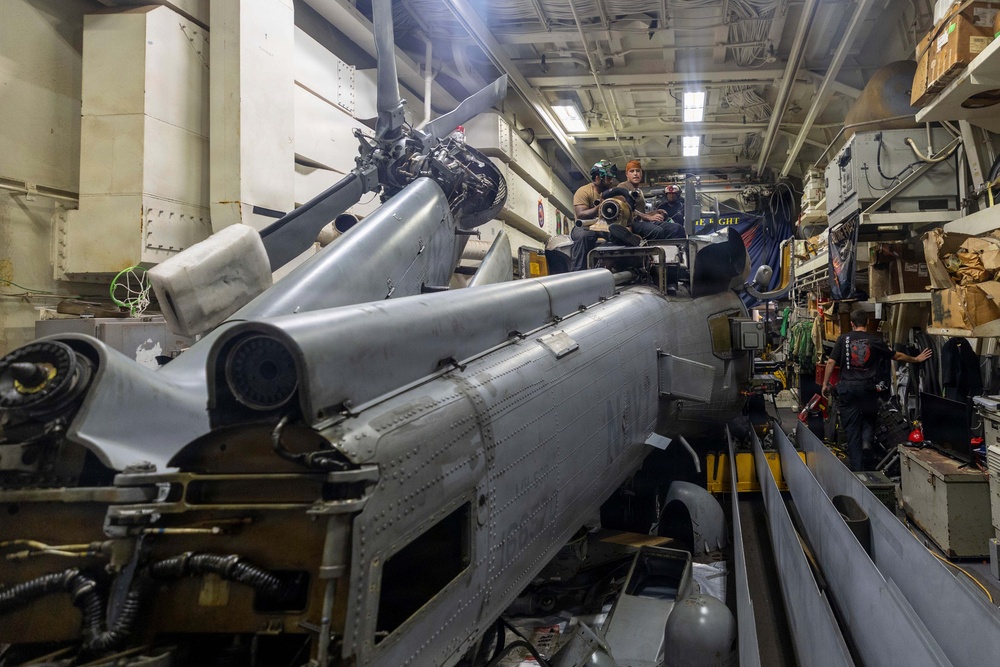 Michael Murphy Conducts Helicopter Maintenance