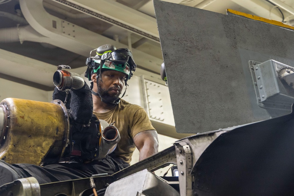 Michael Murphy Conducts Helicopter Maintenance