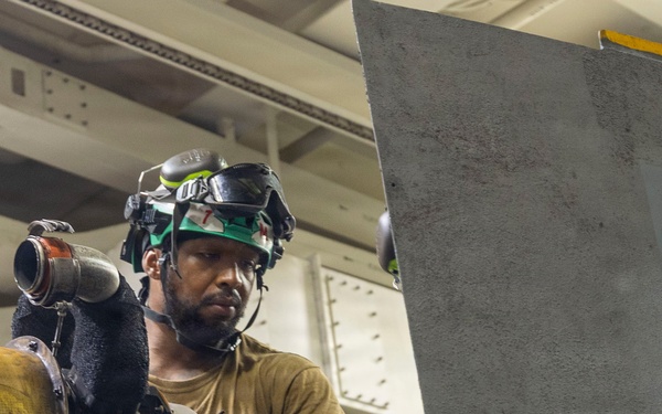 Michael Murphy Conducts Helicopter Maintenance