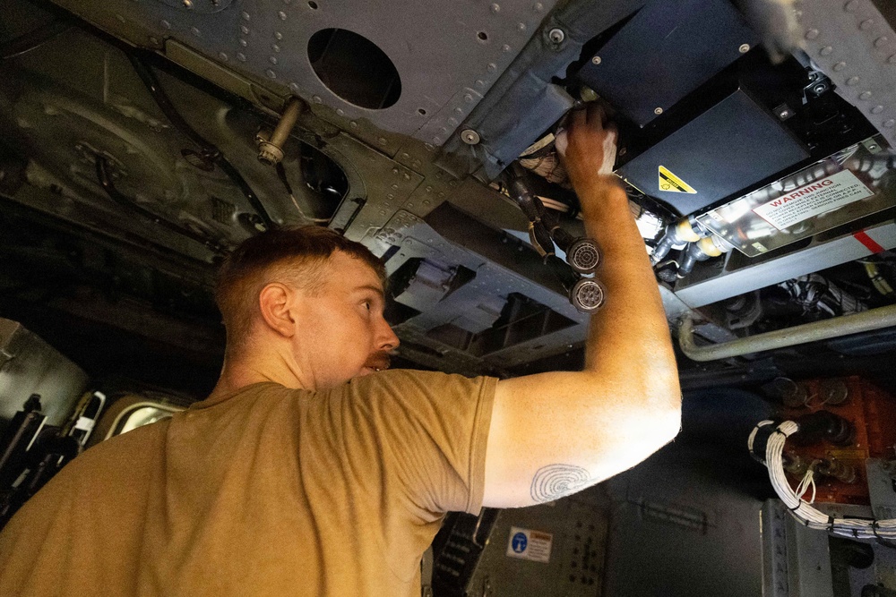 Michael Murphy Conducts Helicopter Maintenance