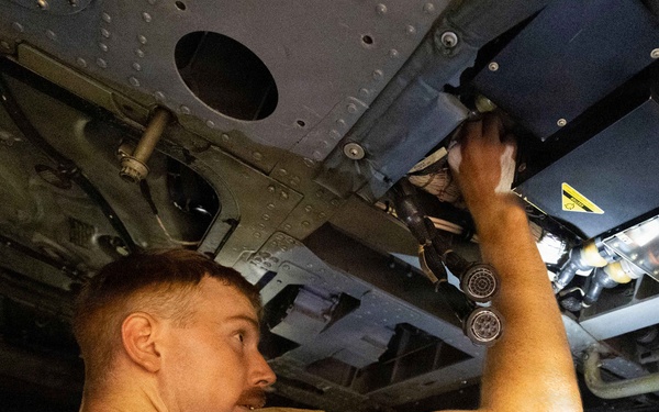 Michael Murphy Conducts Helicopter Maintenance