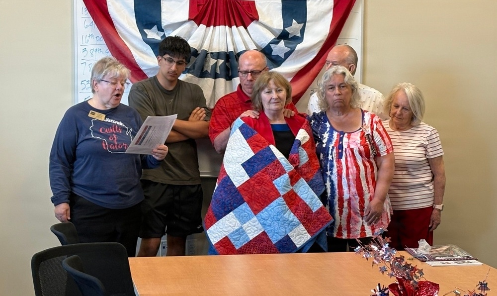 Fort McCoy LRC director, retired lieutenant colonel, receives Quilt of Valor