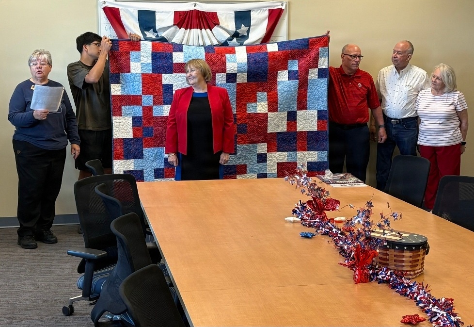 Fort McCoy LRC director, retired lieutenant colonel, receives Quilt of Valor