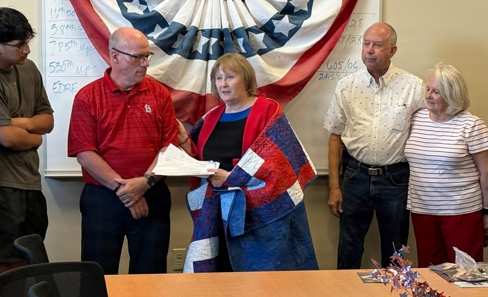 Fort McCoy LRC director, retired lieutenant colonel, receives Quilt of Valor