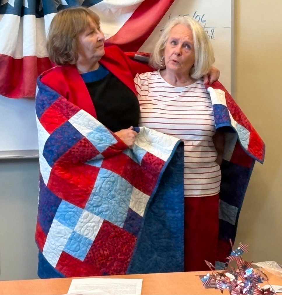 Fort McCoy LRC director, retired lieutenant colonel, receives Quilt of Valor