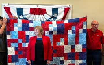 Fort McCoy LRC director, retired lieutenant colonel, receives Quilt of Valor