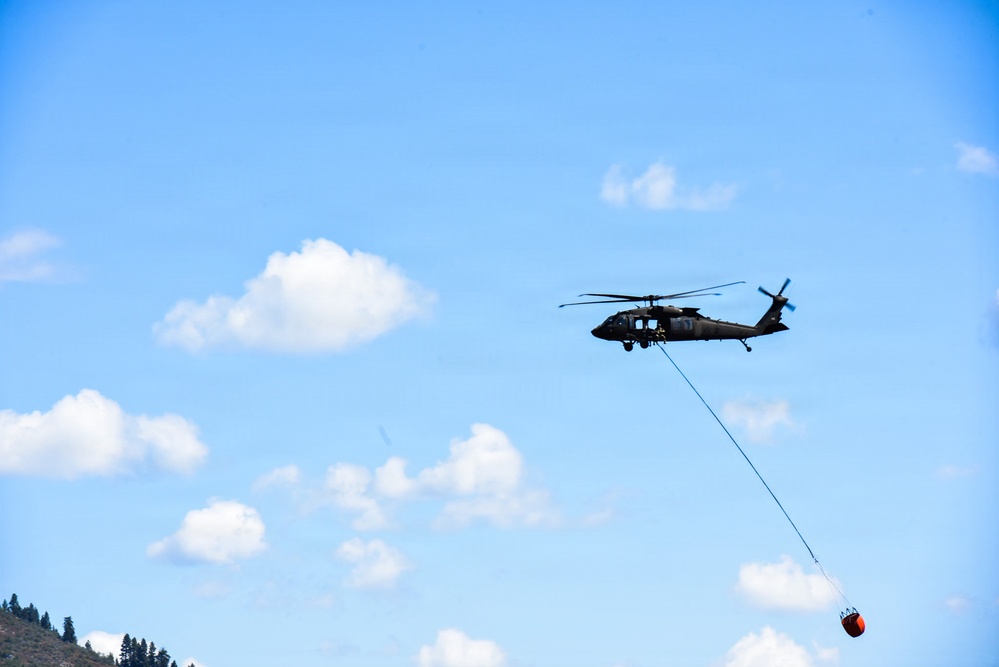 Idaho Army National Guard UH-60M Black Hawk helicopter crew conducts water bucket training
