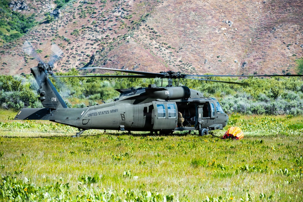 Idaho Army National Guard UH-60M Black Hawk helicopter crew conducts water bucket training.