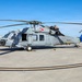 HSC-26 finish painting the tail of their MH-60S Seahawk helicopter