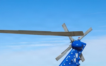 HSC-26 finish painting the tail of their MH-60S Seahawk helicopter