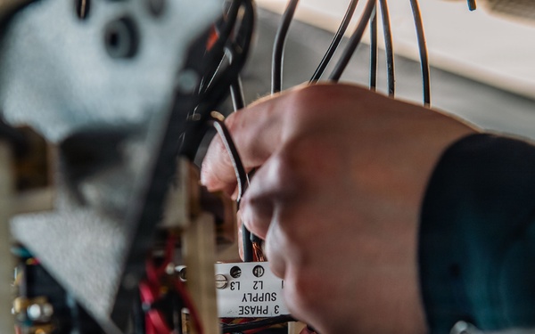Ronald Reagan Sailors Conduct Maintenance On Heater Wiring