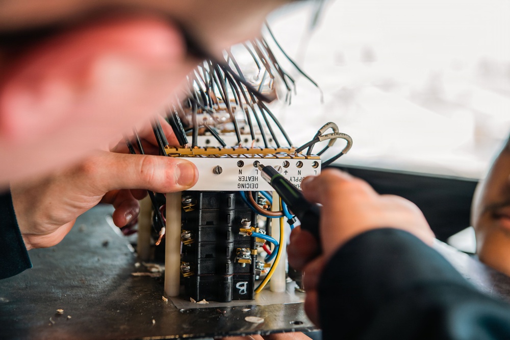 Ronald Reagan Sailors Conduct Maintenance On Heater Wiring