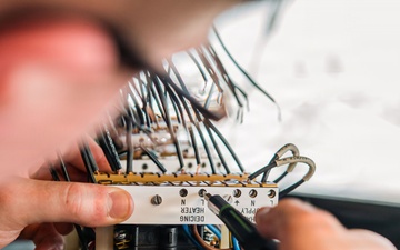 Ronald Reagan Sailors Conduct Maintenance On Heater Wiring