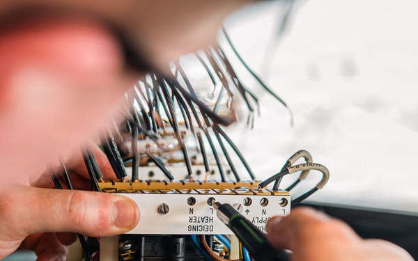 Ronald Reagan Sailors Conduct Maintenance On Heater Wiring