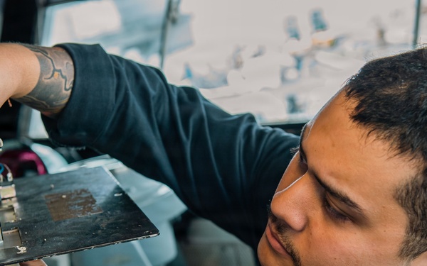 Ronald Reagan Sailors Conduct Maintenance On Heater Wiring