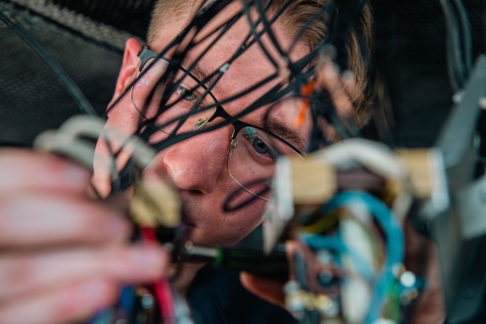 Ronald Reagan Sailors Conduct Maintenance On Heater Wiring