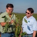 Soybean farmer with RMA employee